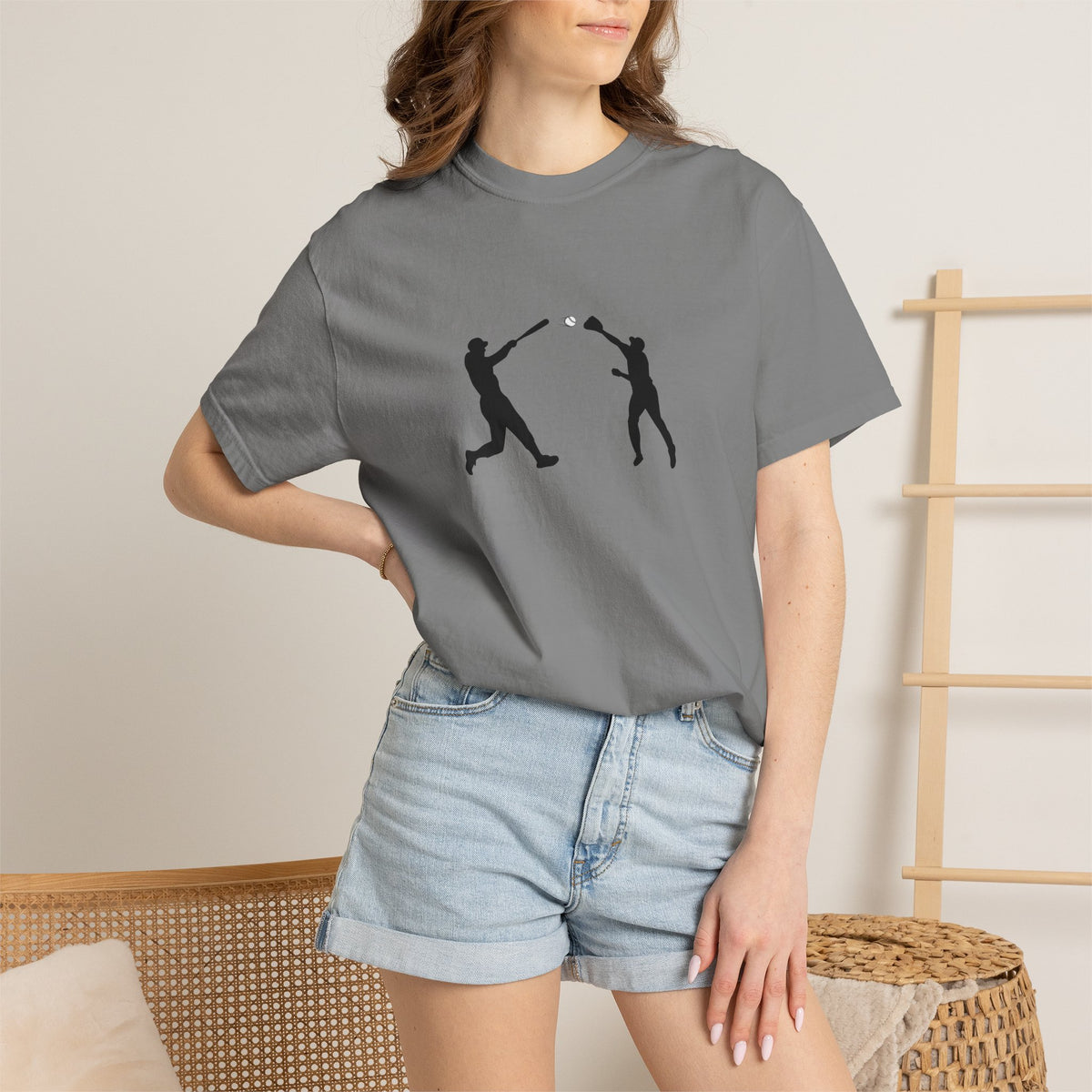 Black baseball silhouette graphic T-shirt for men, featuring minimal baseball player design on soft cotton fabric.