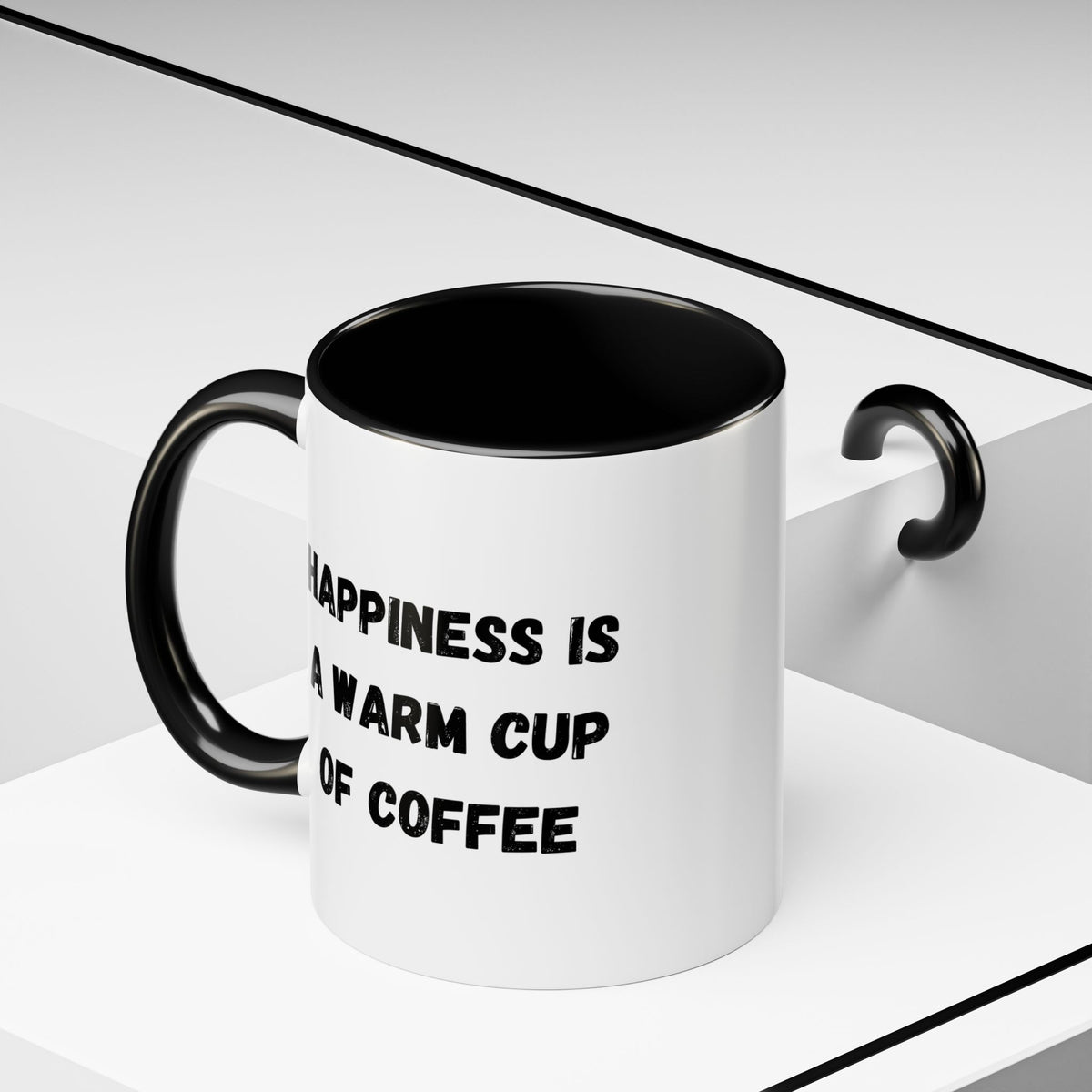 White ceramic coffee mug with "Happiness Is A Warm Cup Of Coffee" quote, featuring a simple, smooth handle and glossy finish.
