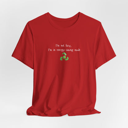 Eco humor T-shirt featuring the phrase "I’m Not Lazy, I’m an Energy-Saving Mock" on a casual printify T-shirt.