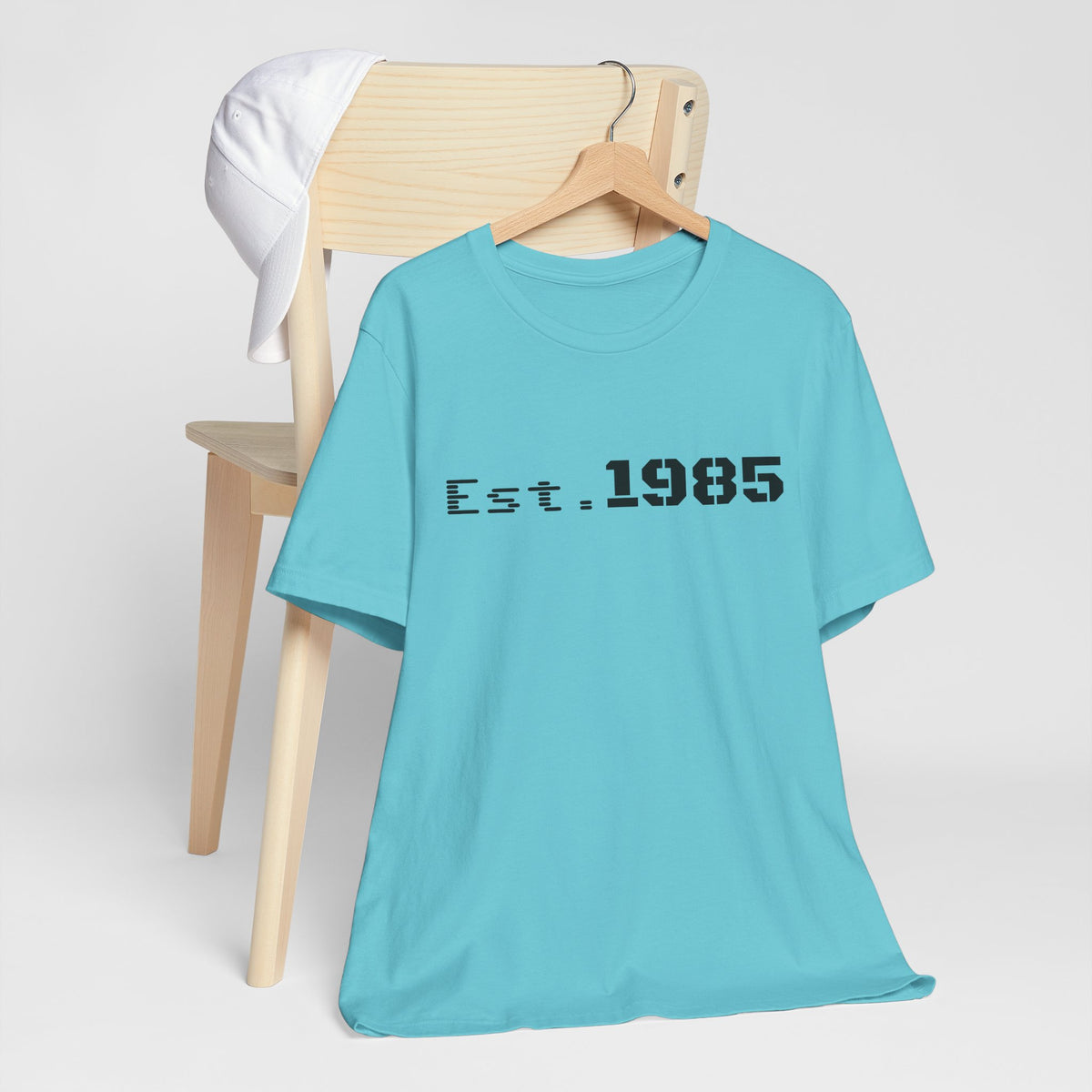 Vintage Est. 1985 graphic T-shirt by Printify featuring retro year design and classic casual style.