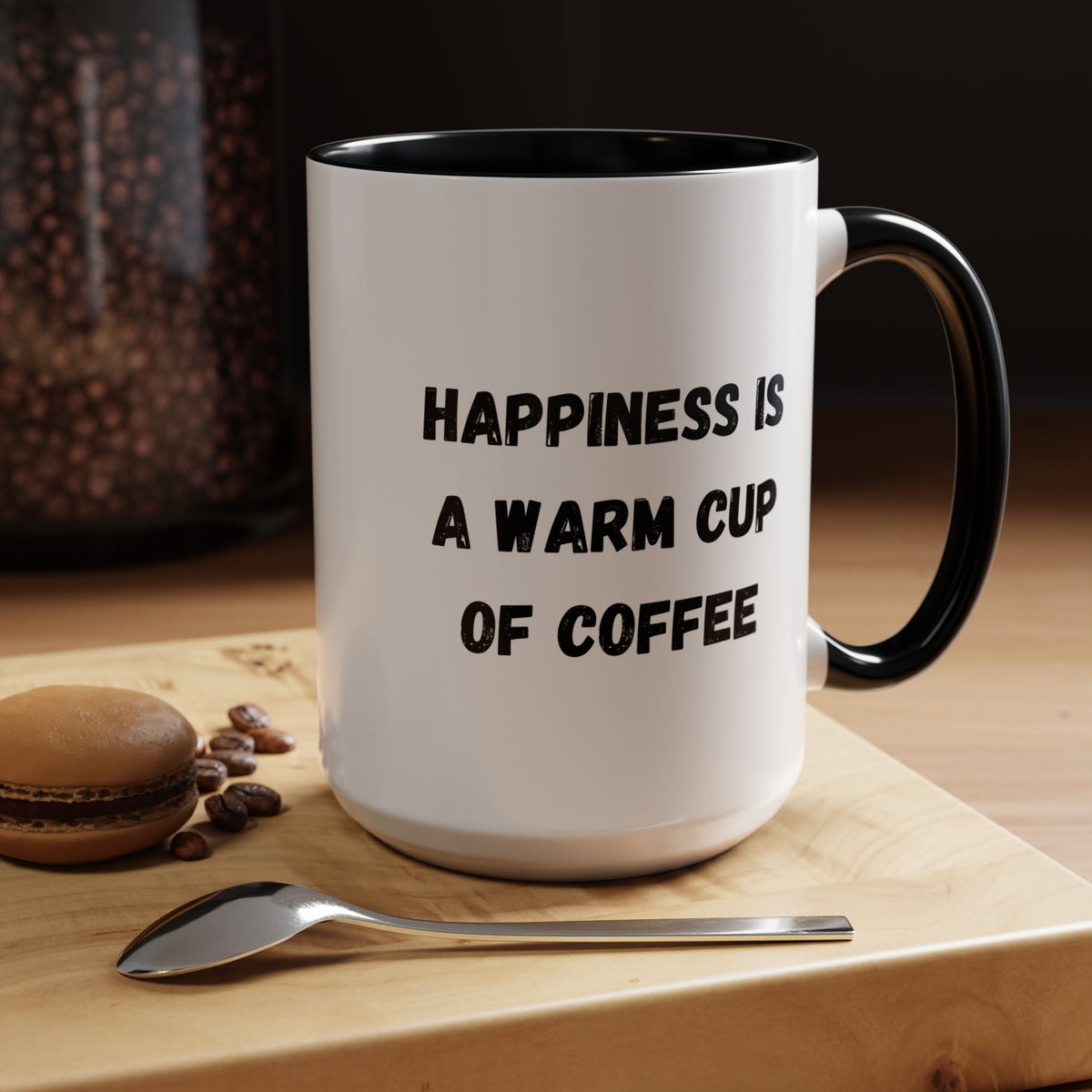 Ceramic coffee mug with the phrase “Happiness Is A Warm Cup Of Coffee” in black text, featuring a white background.