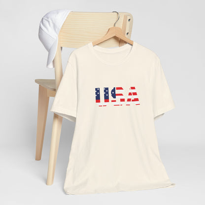 USA Flag Text T-Shirt by Printify featuring patriotic red, white, and blue design perfect for Fourth of July celebrations.