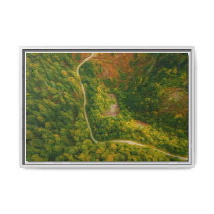 Colorful framed matte canvas wall art featuring an aerial view of a forest path landscape by Printify.