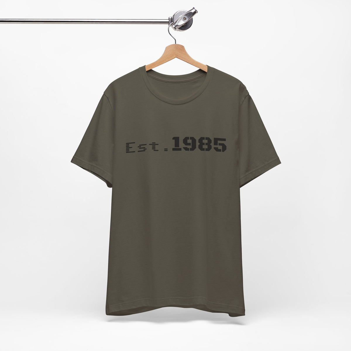 Vintage Est. 1985 graphic T-shirt by Printify featuring a retro design and bold text on a classic cotton T-shirt.