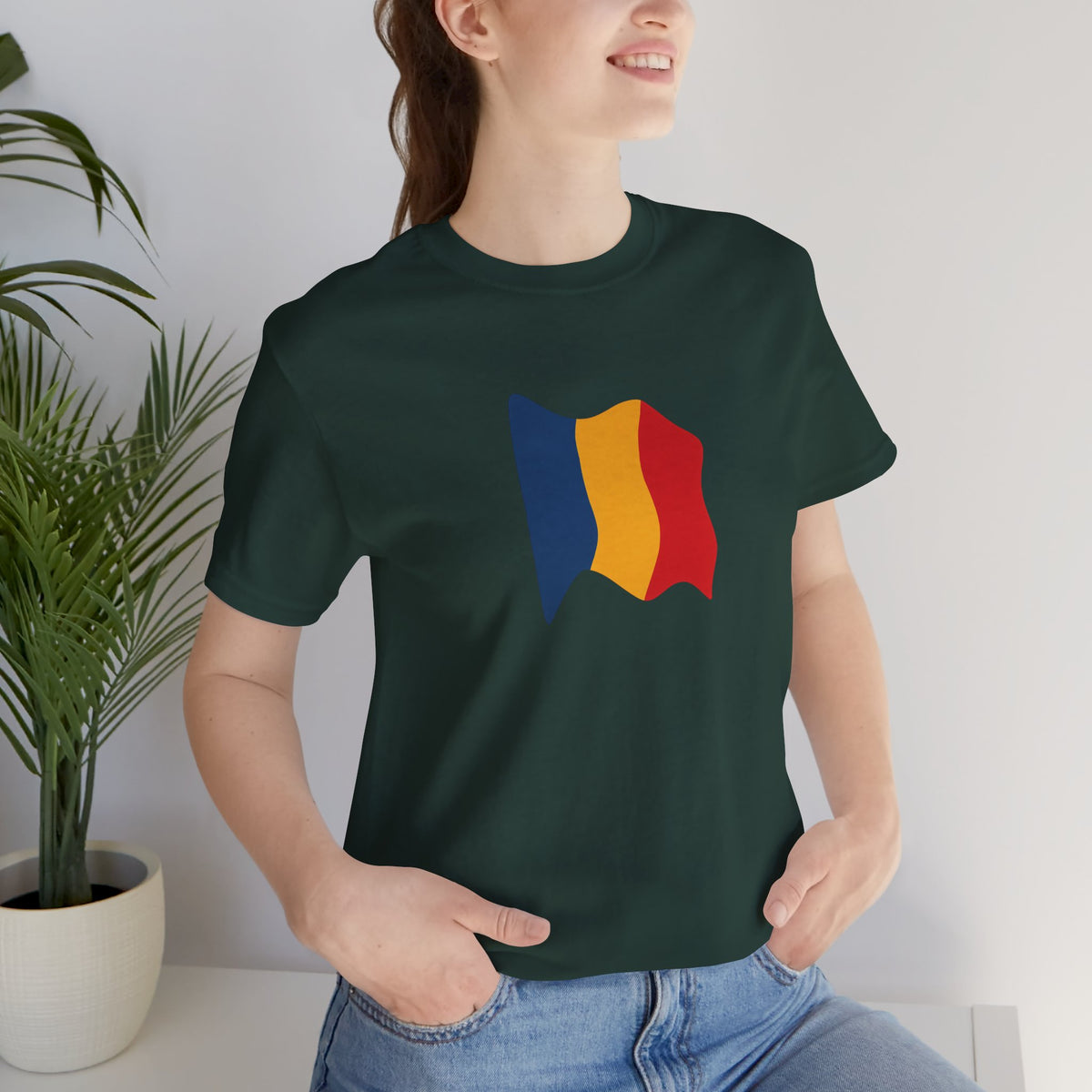 Romania flag T-shirt by Printify featuring a minimal waving tricolor design on a casual T-shirt.