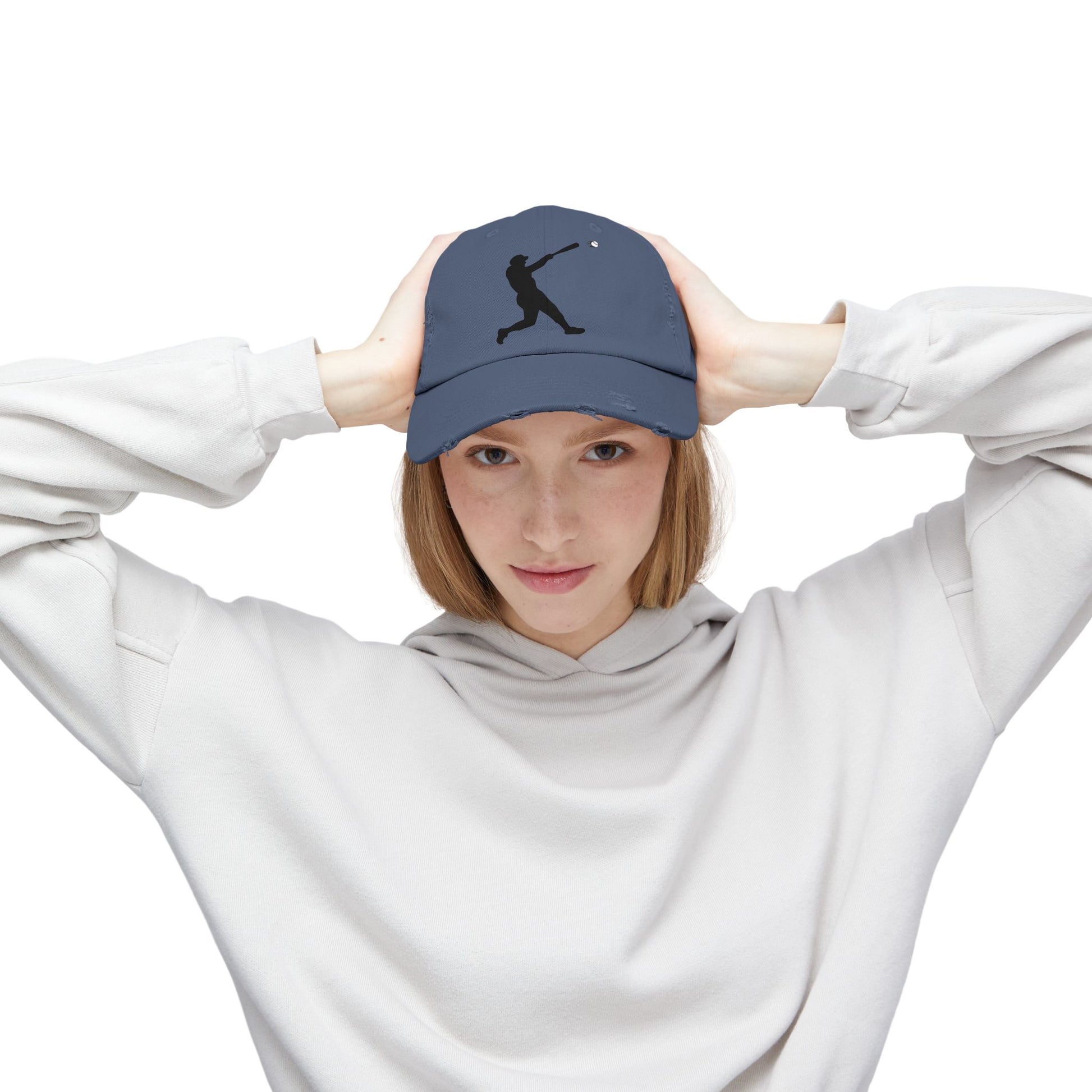 Distressed baseball cap with silhouette batter design, printed by Printify, featuring a casual, vintage-style hat with distressed details.