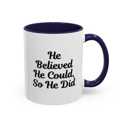 Printify "He Believed He Could So He Did" inspirational coffee mug with bold black text on white ceramic surface.