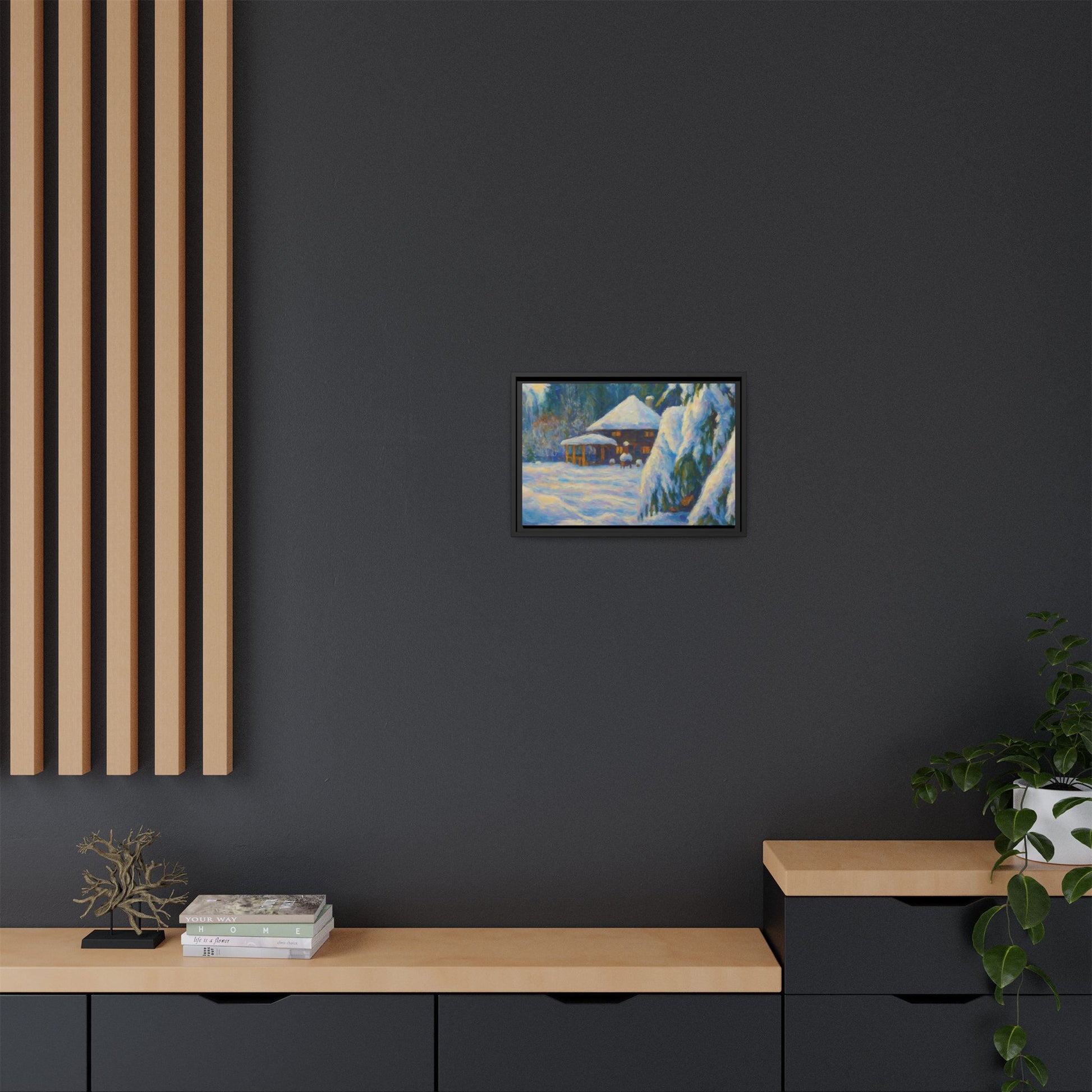 Framed matte canvas print of a snowy cabin winter landscape, featuring a cozy cabin surrounded by snow-covered trees.