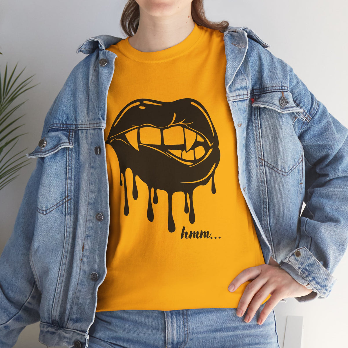 Graphic T-shirt by Printify featuring a dripping lips design with the text "hmm..." in bold, casual style on a white background.