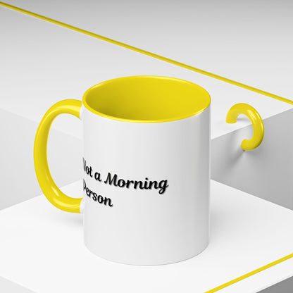 Ceramic coffee mug with "Not a Morning Person" print, 11oz or 15oz size, by Printify, featuring a humorous design on a white mug.