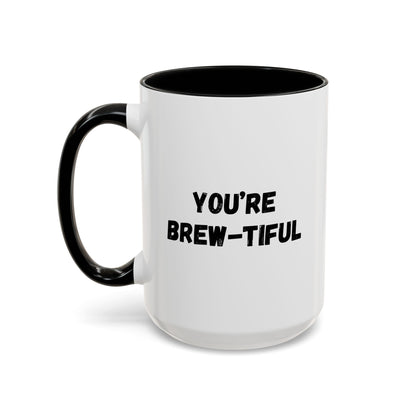 You’re Brew-tiful Coffee Mug – Cute Coffee Pun Accent Mug (11/15oz) — white ceramic accent mug with glossy finish and bold black “YOU’RE BREW-TIFUL” print, angled view