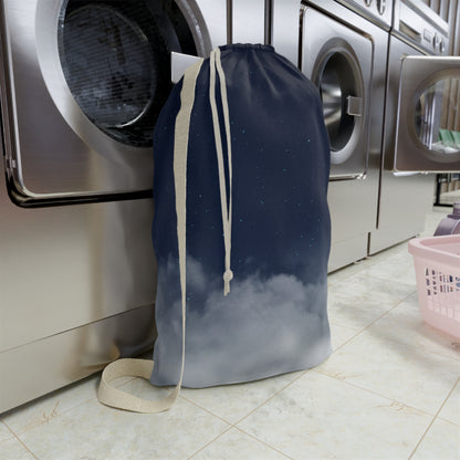 Canvas laundry bag with night sky clouds print and drawstring closure, ideal for laundry organization and storage.
