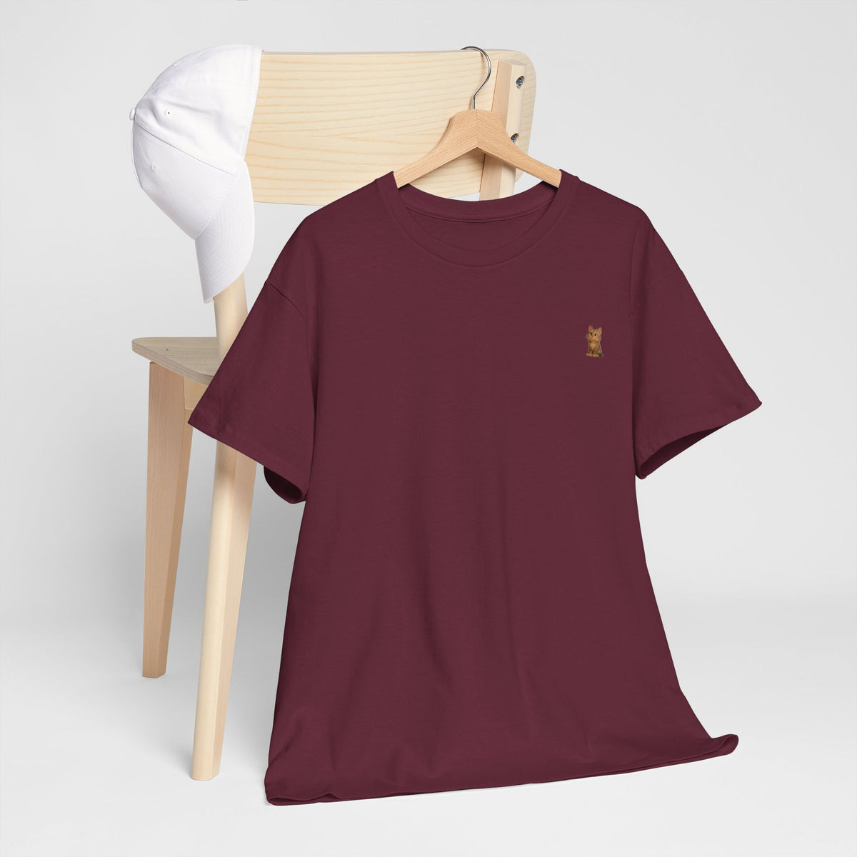 Brown kitten graphic T-shirt for cat lovers, featuring a cute cat design on a comfortable Printify T-shirt.
