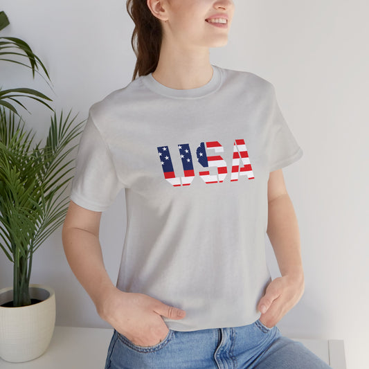 USA flag patriotic T-shirt with "USA" text, red, white, and blue colors, casual Fourth of July themed print on cotton fabric