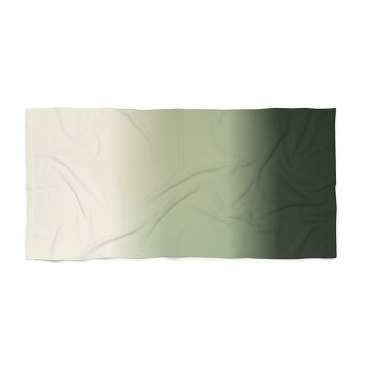 Green ombre gradient beach towel with coastal stripe fade, featuring soft fabric and vibrant ocean-inspired colors.