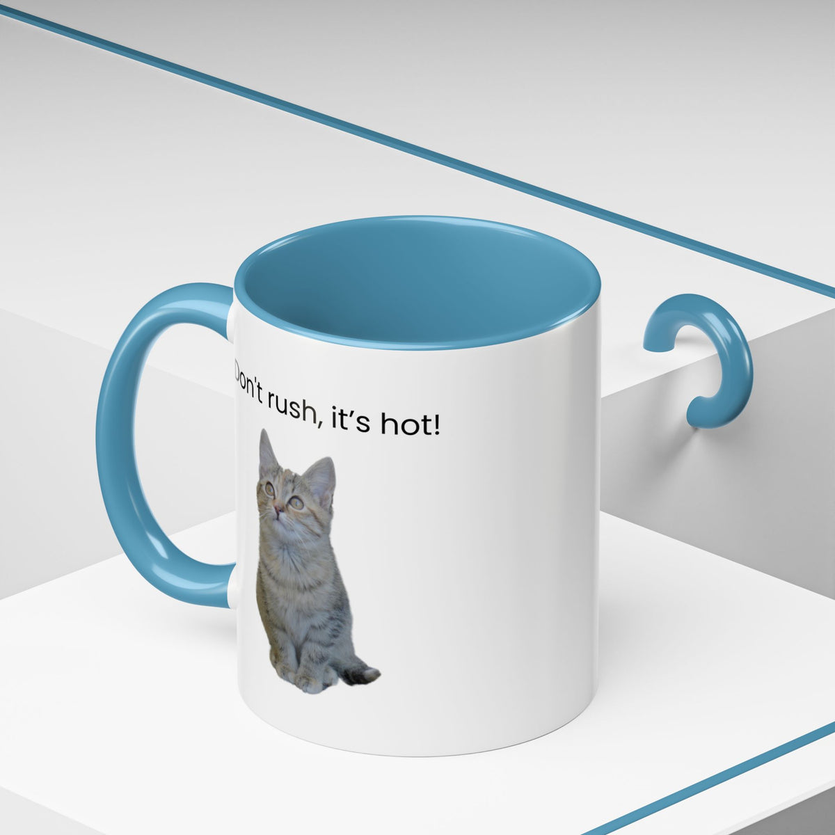 Ceramic cat coffee mug with "Don't rush, it's hot!" phrase, 11 oz, black handle, and colorful printed design.
