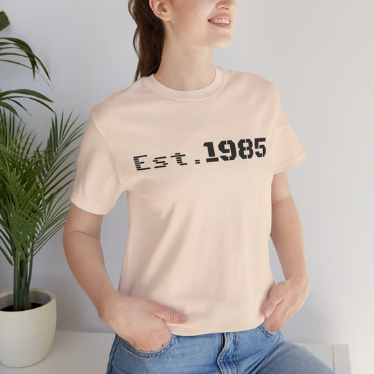 Vintage Est. 1985 graphic T-shirt by Printify featuring a stylish design celebrating the year 1985.