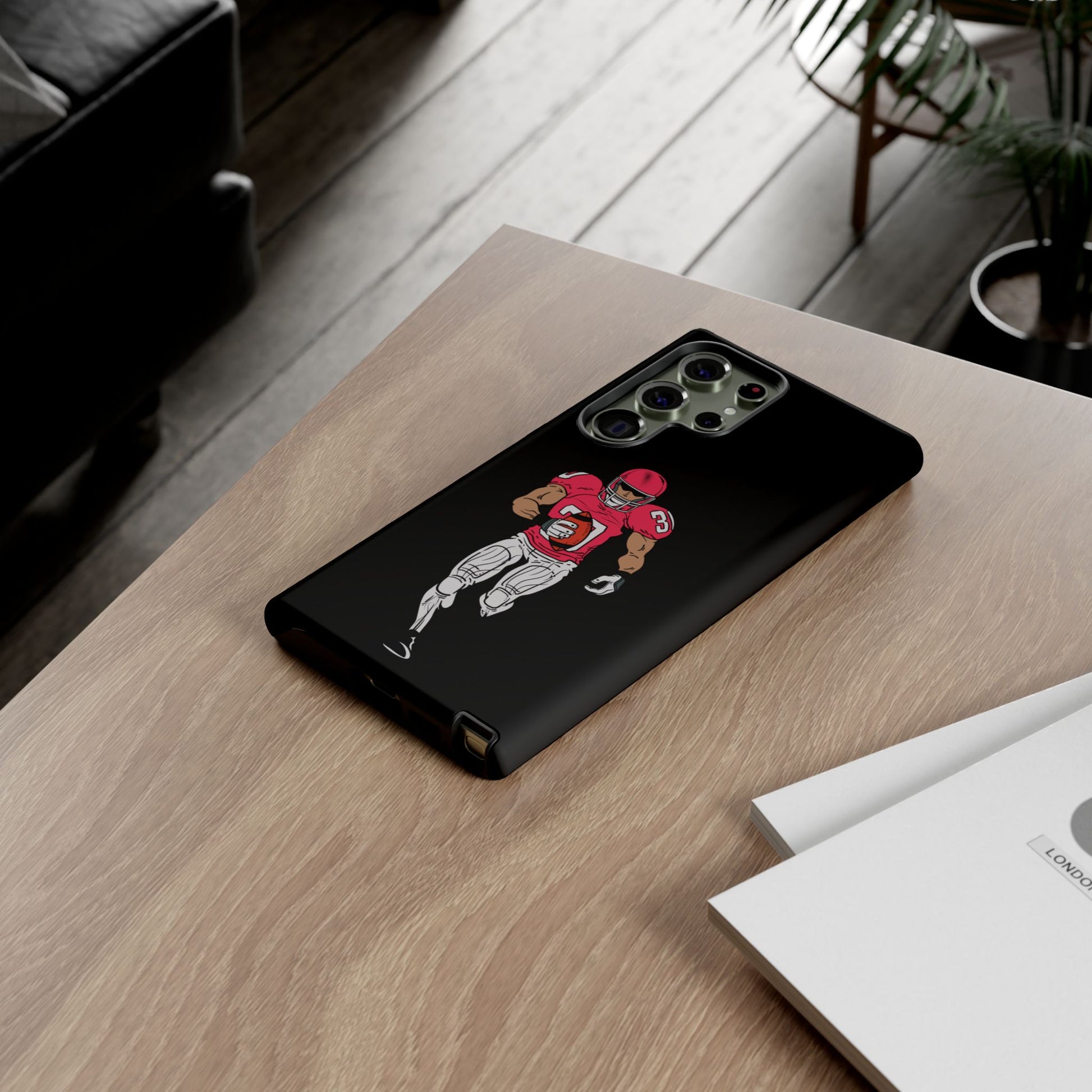 Black football player tough phone case for iPhone, protective sports-themed design by Printify featuring athlete silhouette.