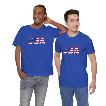 Red, white, and blue USA Flag Text T-Shirt by Printify featuring patriotic Fourth of July design on a casual cotton tee.
