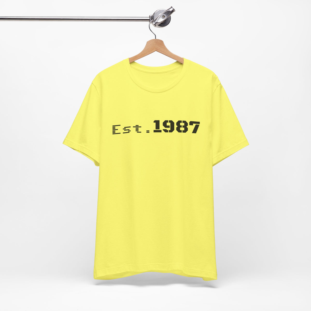 Vintage Printify Est. 1987 T-Shirt featuring retro Born 1987 design on a casual cotton tee.