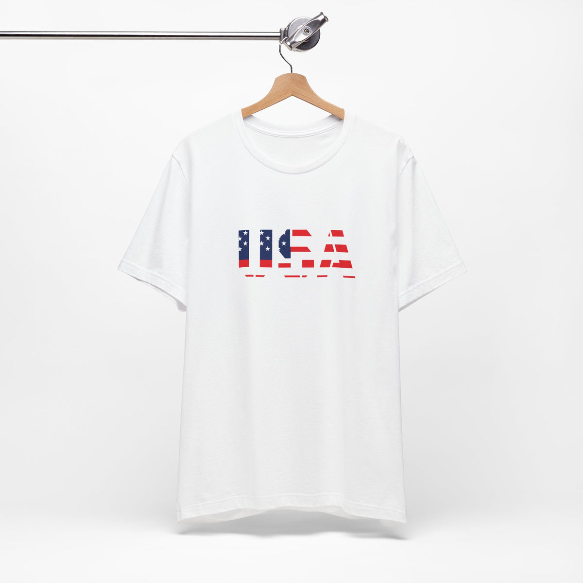 USA Flag text T-Shirt by Printify featuring patriotic Fourth of July design, with bold American flag and text on soft fabric.