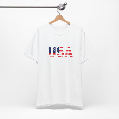USA Flag text T-Shirt by Printify featuring patriotic Fourth of July design, with bold American flag and text on soft fabric.