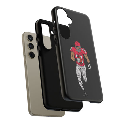 Black football player tough phone case for iPhone, featuring sports design and protective build by Printify