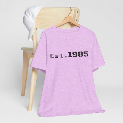 Vintage Est. 1985 graphic T-shirt by Printify featuring a retro design on a classic cotton T-shirt.