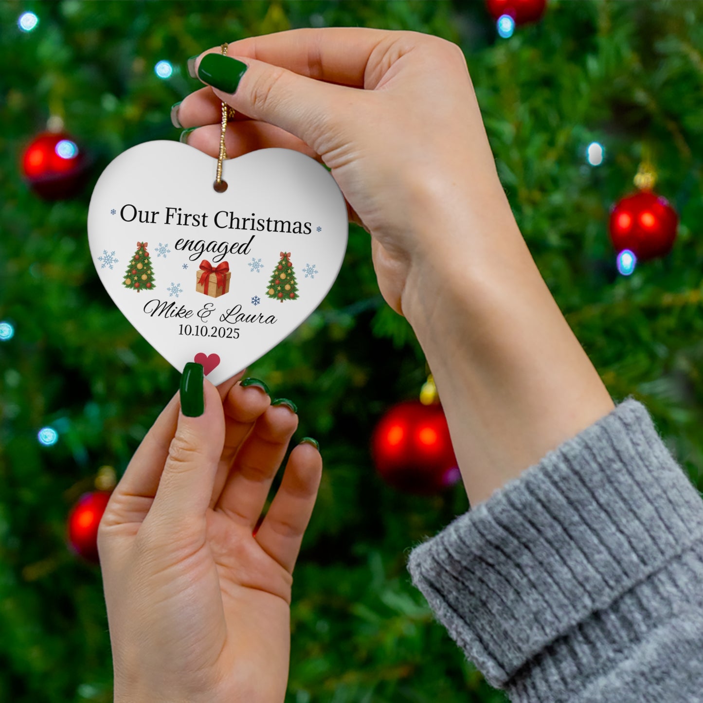 Personalized first Christmas engaged heart ornament with names and date, featuring a festive holiday design from Printify.