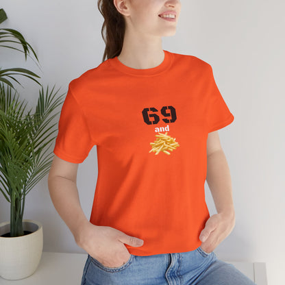 Unisex graphic T-shirt with humorous 69 and French fries design, featuring colorful print on soft cotton fabric.