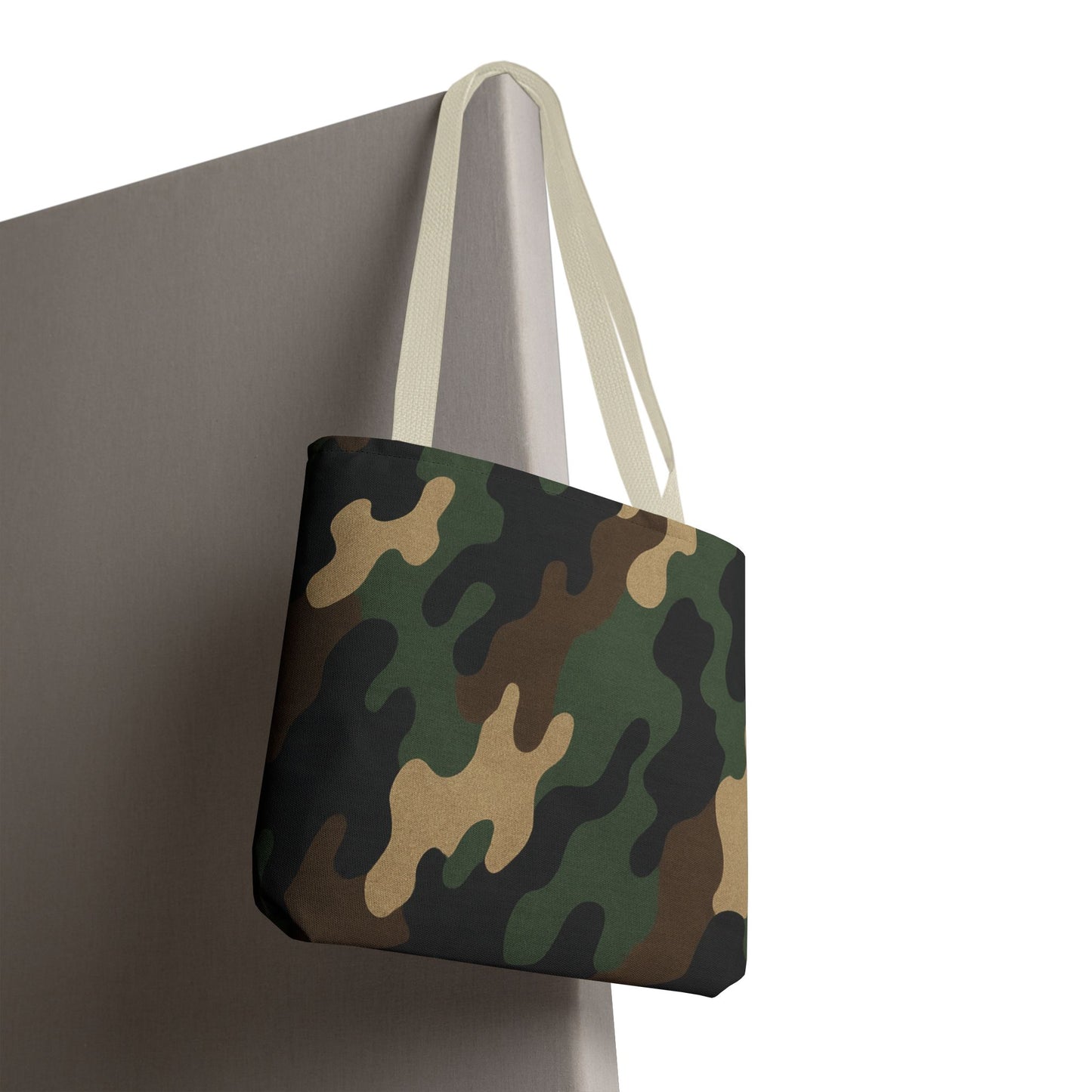 Camo pattern tote bag with all-over print canvas design, stylish carryall bag by Printify featuring a spacious interior and sturdy handles.