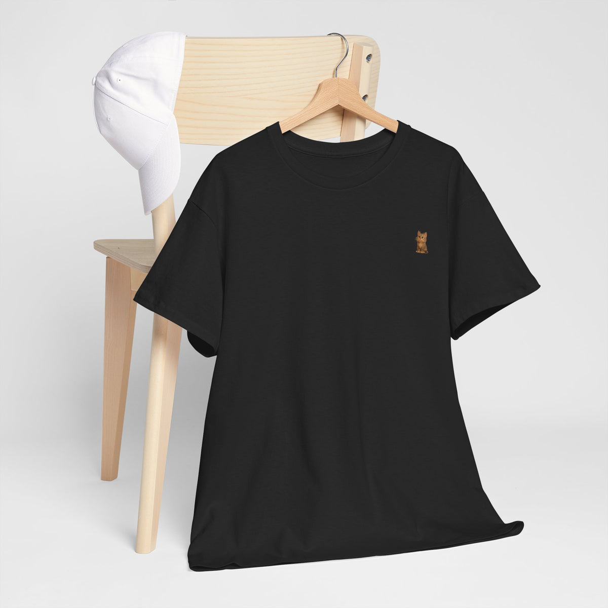 Brown kitten graphic T-shirt for cat lovers, featuring a cute feline design on a comfortable Printify T-shirt.