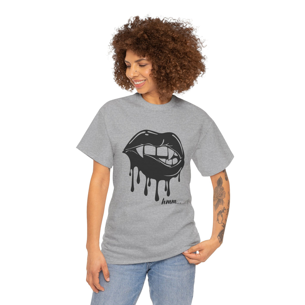 Graphic T-shirt by Printify featuring a dripping lips design with the word "hmm..." in a bold, artistic bite style.
