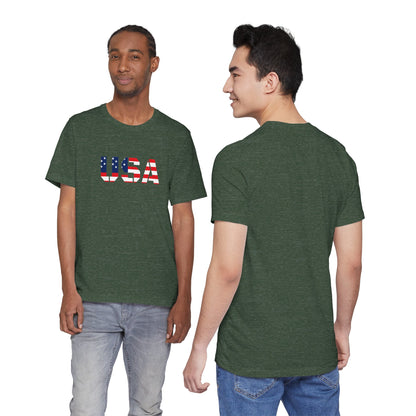 Red, white, and blue USA flag text T-shirt by Printify featuring patriotic Fourth of July design for men and women.