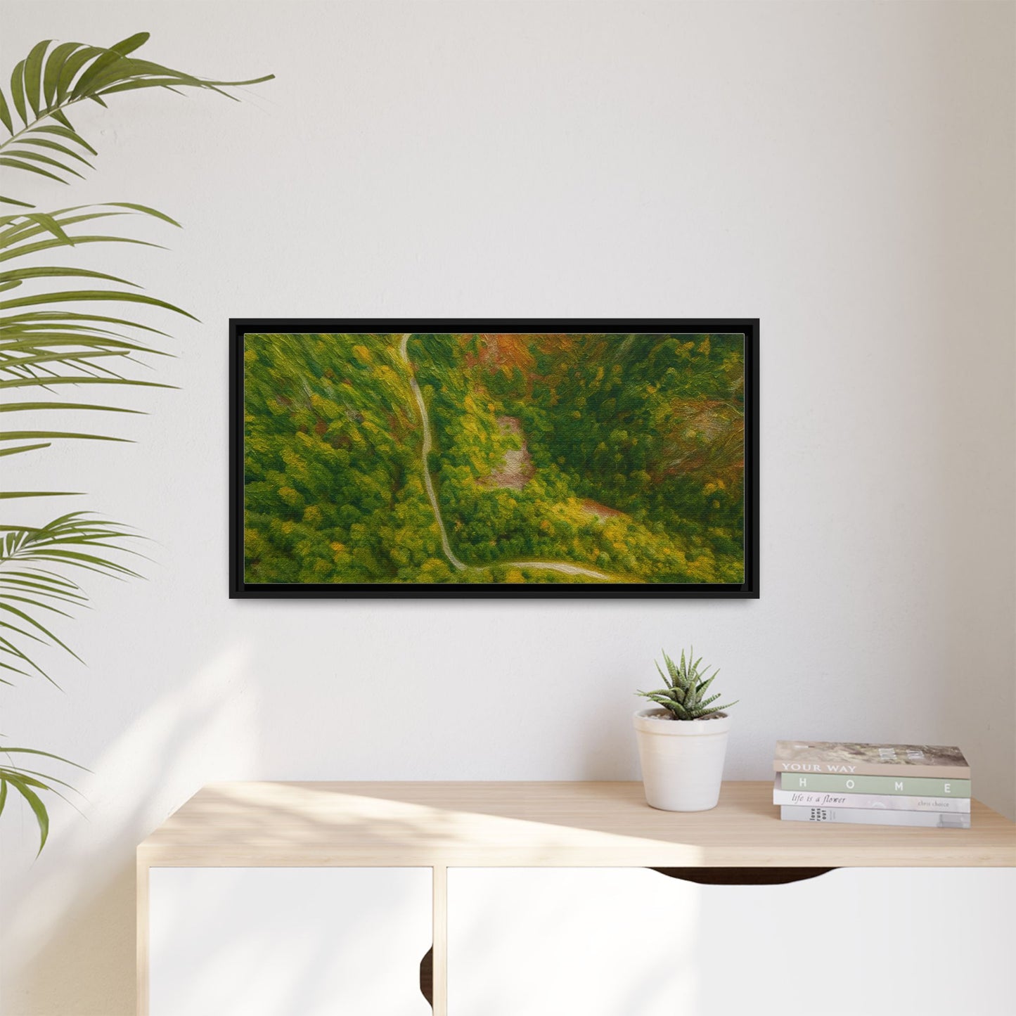Colorful framed matte canvas wall art featuring an aerial forest path landscape by Printify.