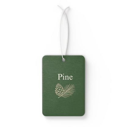 Green pinecone-shaped car air freshener with botanical scent tag, designed as a stylish accessory for vehicle interior.
