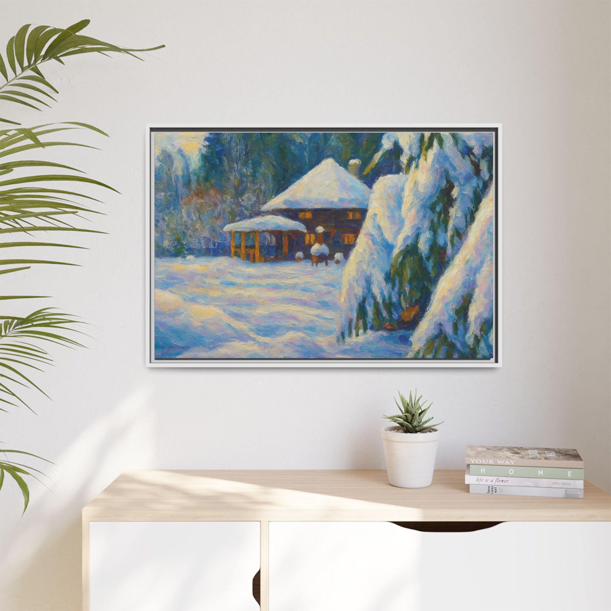 Framed matte canvas of a snowy cabin winter landscape wall art by Printify, showcasing a cozy cabin surrounded by snow-covered trees.