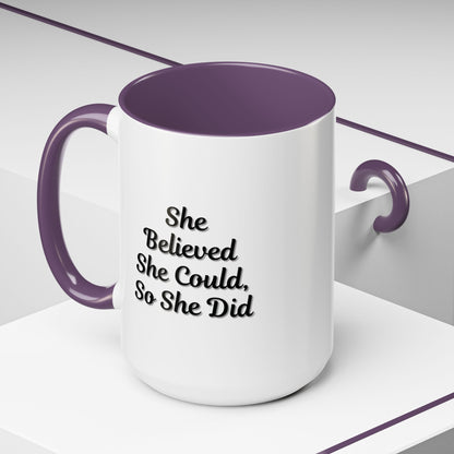 White ceramic motivational coffee mug with the quote "She Believed She Could, So She Did" in black lettering.
