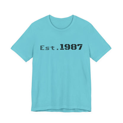 Vintage Est. 1987 T-Shirt by Printify featuring a classic born in 1987 design on a casual cotton tee.