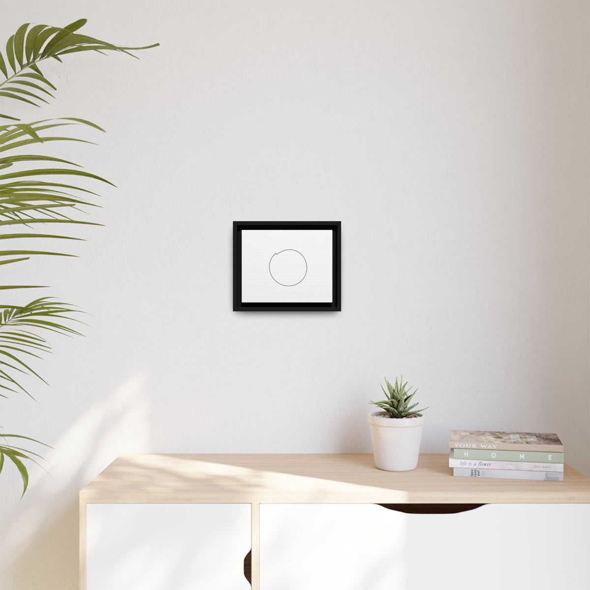 Framed matte canvas wall art featuring a minimal circular line design, by Printify, perfect for modern home decor.