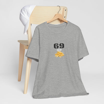 Unisex graphic T-shirt featuring a humorous 69 and French fries design, made by Printify, displayed on a hanger.