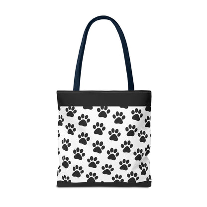Eco-friendly tote bag with paw print design, perfect for dog and cat lovers, made by Printify for casual carryall use.