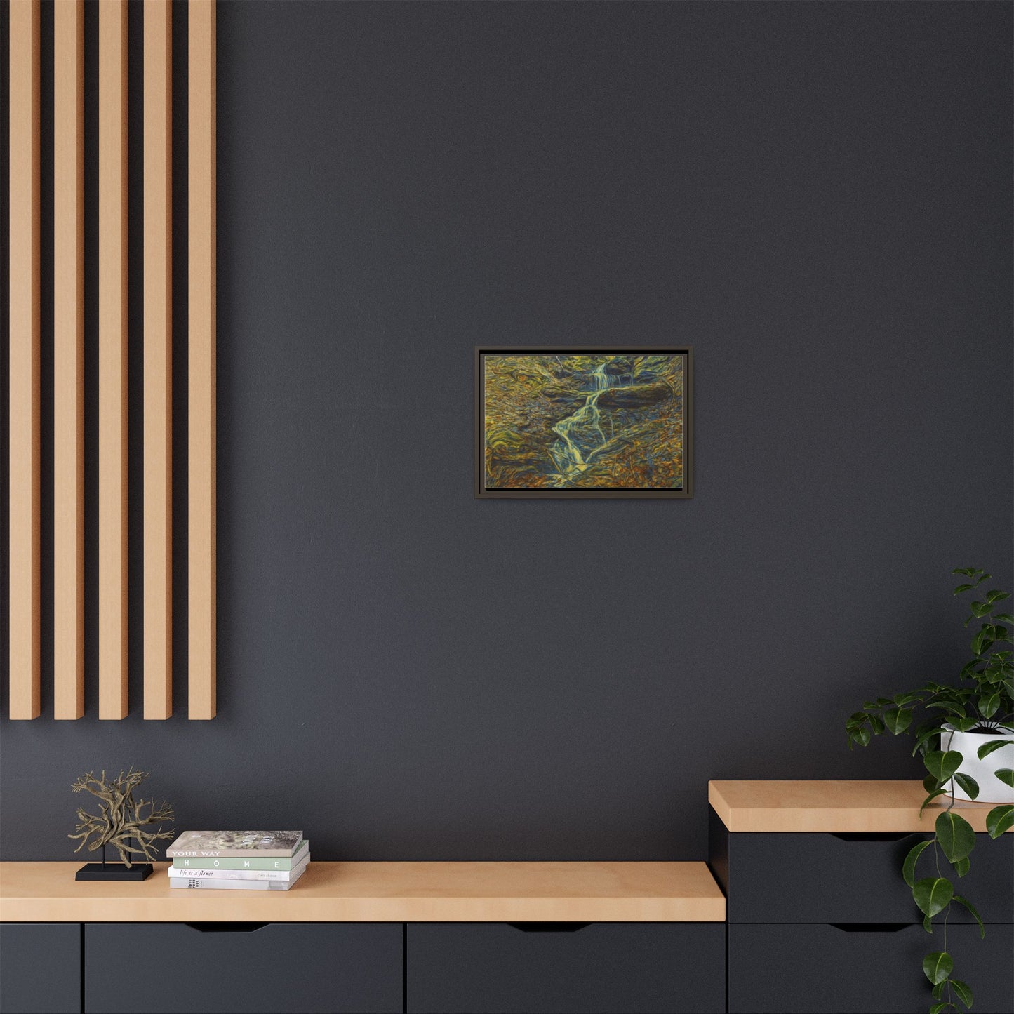 Framed matte canvas wall art of an autumn forest with a waterfall, featuring vibrant fall foliage and natural scenery.
