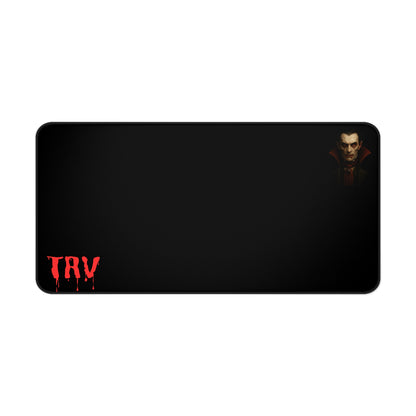 Vampire blood drip desk mat with vampire portrait design, black and red color scheme, ideal for gaming or office use.