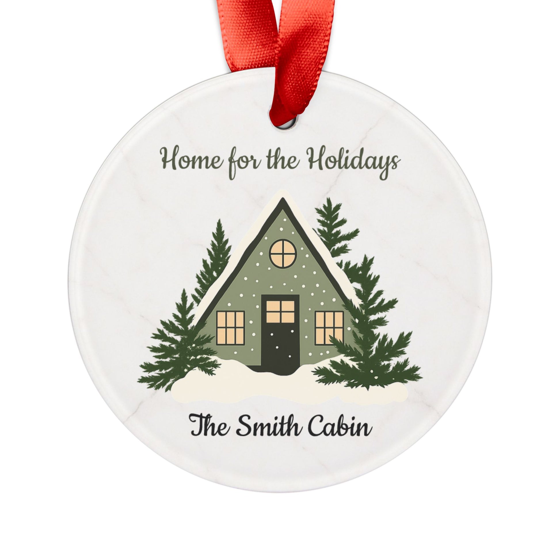 Acrylic "Home for the Holidays" cabin ornament with festive winter scene, ideal for holiday decorations and Christmas tree embellishments.
