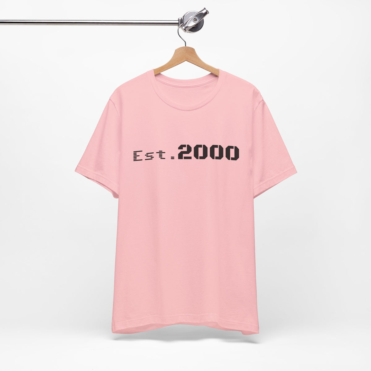 Retro pixel design T-shirt by Printify, born in 2000, with "Est. 2000" text on a casual printed T-shirt.