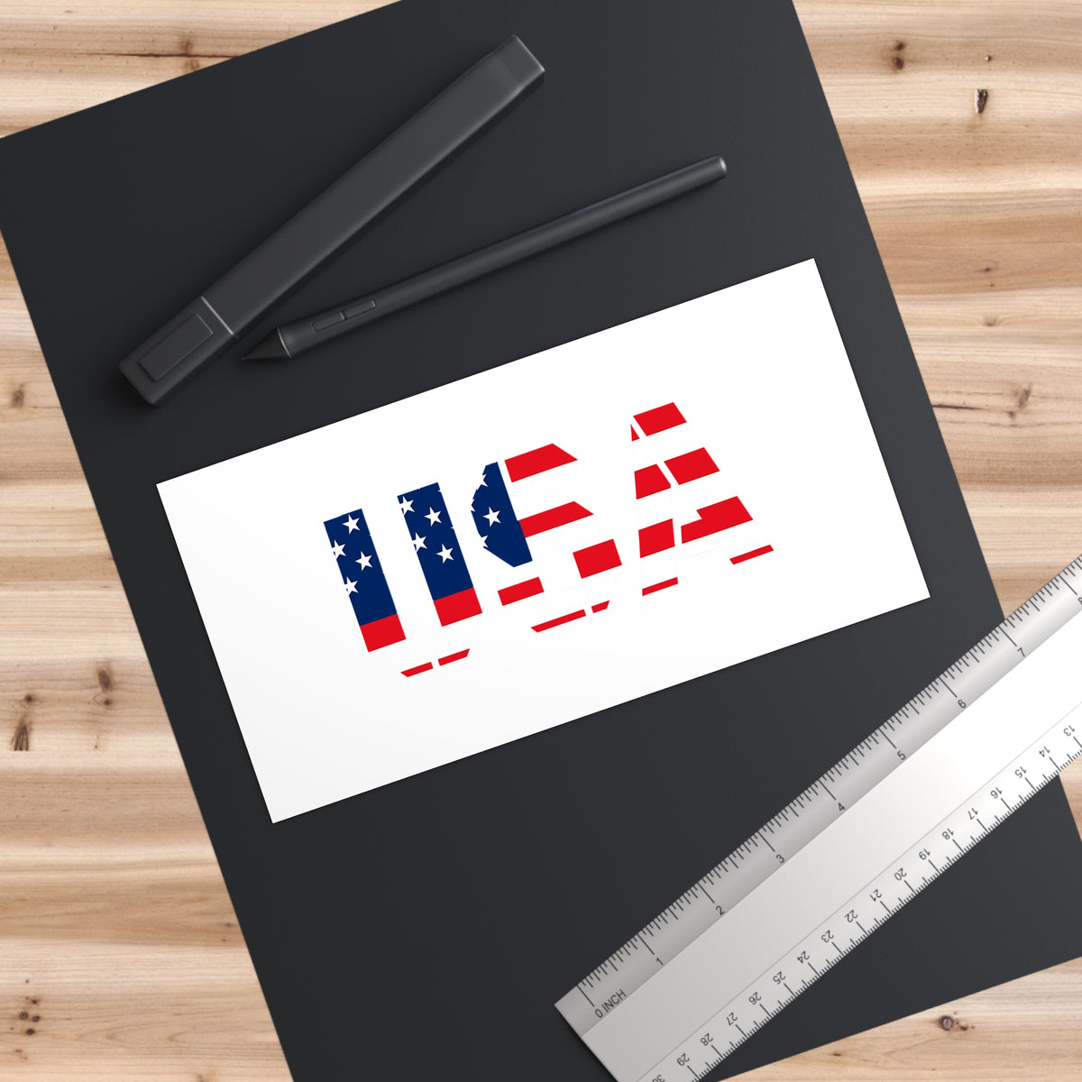 Red, white, and blue USA flag bumper sticker with patriotic design on paper material, ideal for patriotic car or surface decoration.