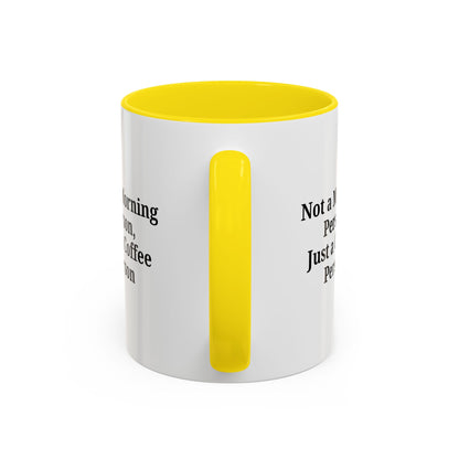 Ceramic coffee mug with "Not a Morning Person, Just a Coffee Person" printed in black text, featuring a white background.