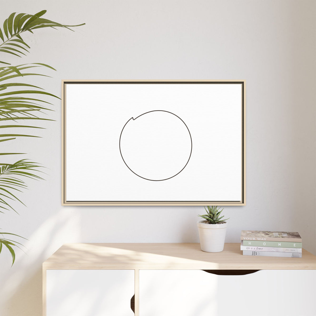 Framed matte canvas wall art featuring a minimal circular line design, by Printify, displayed on a neutral wall.