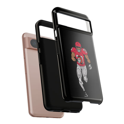 Black football player tough phone case for iPhone, protective sports design by Printify, featuring athletic theme and durable material.